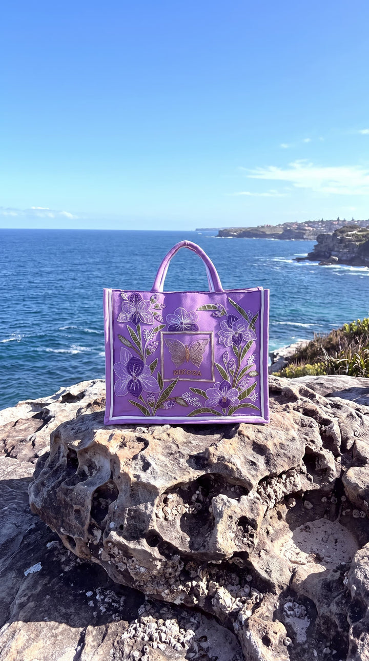 Goddess in Lilac Beach Bag
