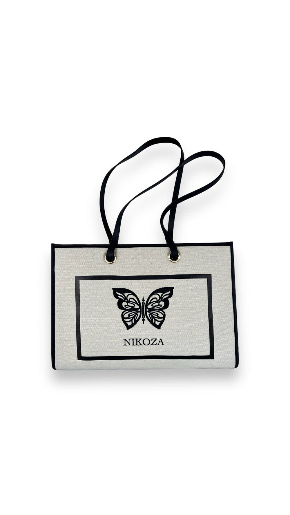 black-beige Tina Beach Tote Bag 2023 Beige/Black Beige Canvas Tote Beach Bag with black leather handles and Black leather trim Olga Nikoza Swimwear