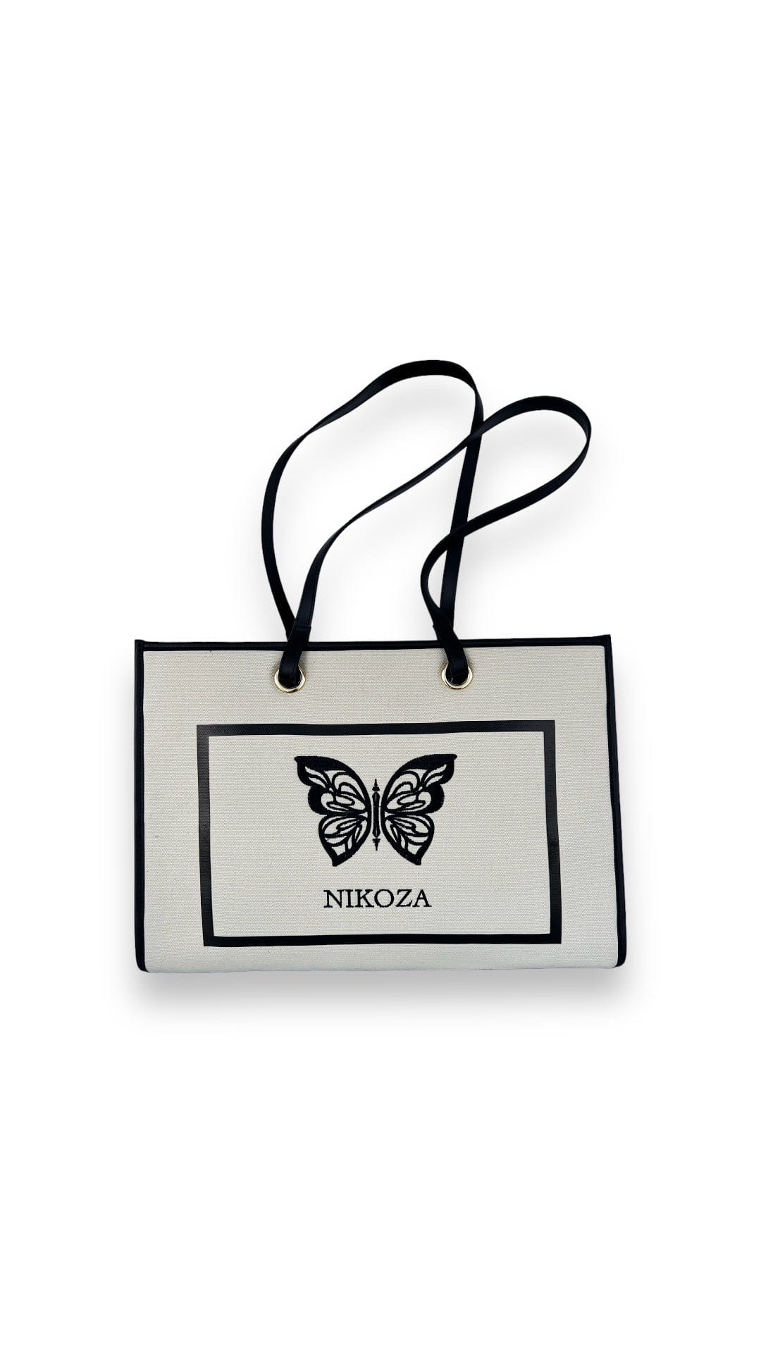 black-beige Tina Beach Tote Bag 2023 Beige/Black Beige Canvas Tote Beach Bag with black leather handles and Black leather trim Olga Nikoza Swimwear