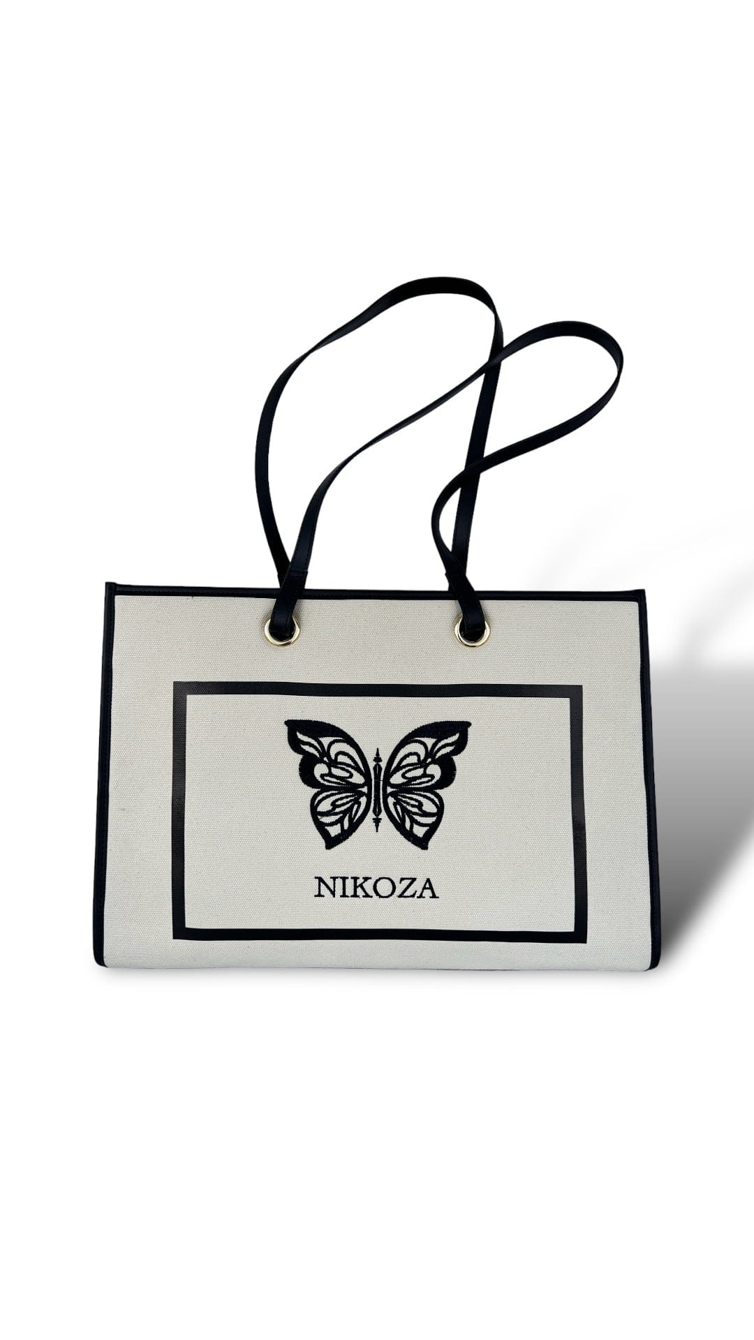 black-beige Tina Beach Tote Bag 2023 Beige/Black Beige Canvas Tote Beach Bag with black leather handles and Black leather trim Olga Nikoza Swimwear