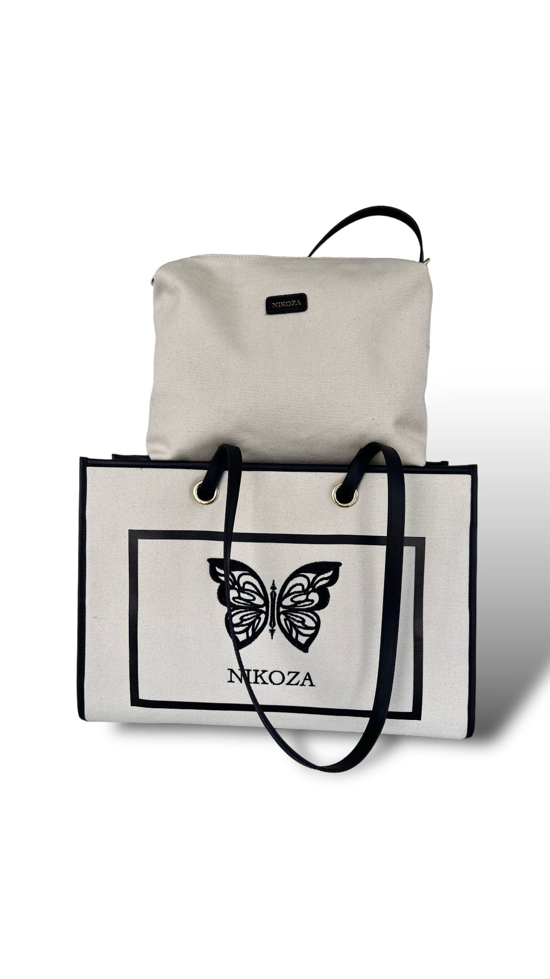 black-beige Tina Beach Tote Bag 2023 Beige/Black Beige Canvas Tote Beach Bag with black leather handles and Black leather trim Olga Nikoza Swimwear
