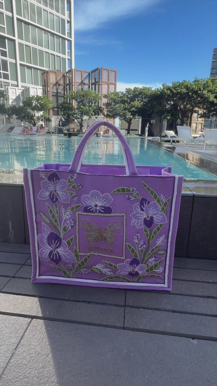 Goddess in Lilac Beach Bag